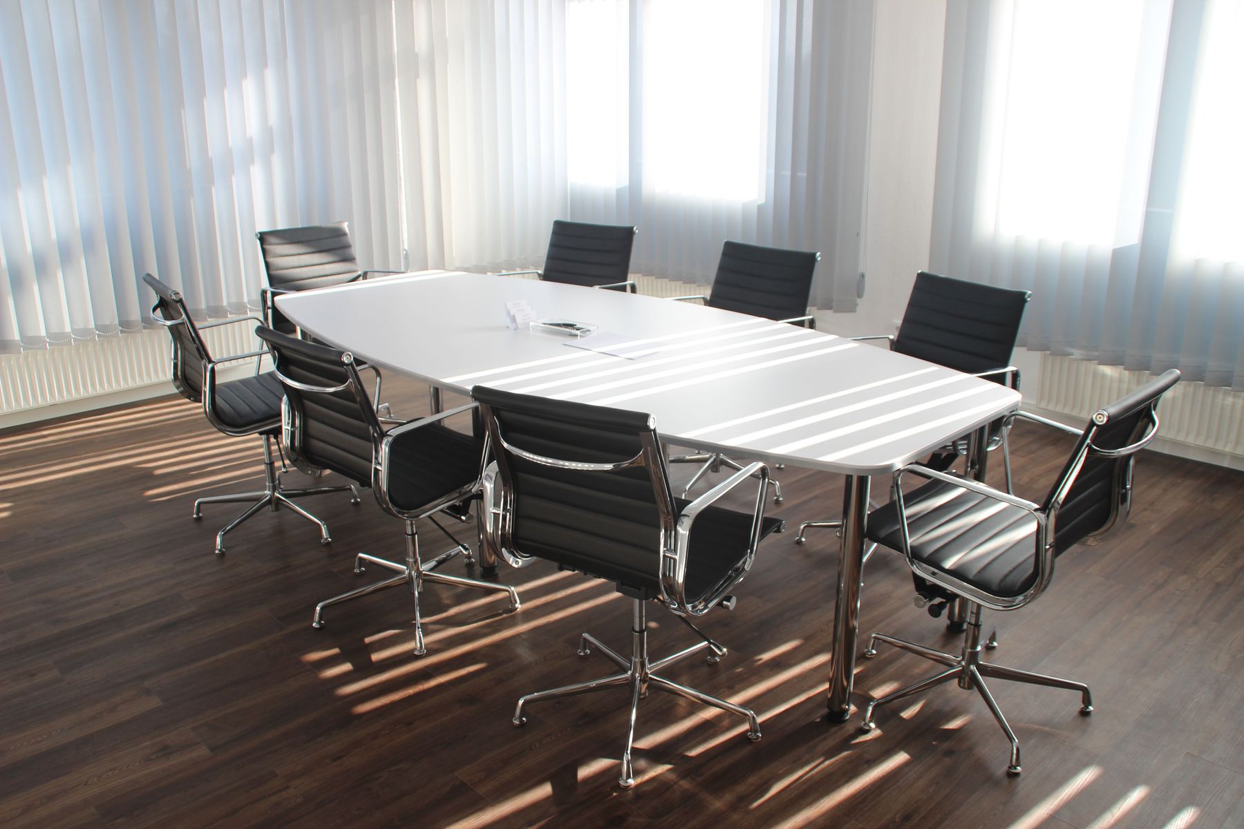 Morning light across an empty meeting room